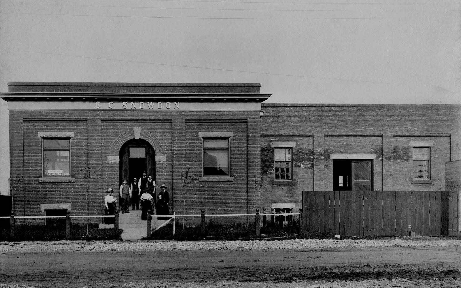 An historical photo of the outside of the c.c. snowdon building Calgary Heritage Roasting Companies coffee shop located in Calgary 